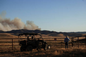 Firefighters tackle the Madre Fire near New Cuyama