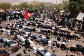 University students and professors perform prayers to ask for rain in Sanaa