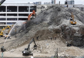 Rescuers search for survivors after signs of life detected under Bangkok building rubble