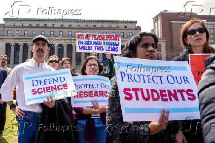 Members of Columbia Medical staff and faculty protest against federal funding cuts at Columbia University in New York