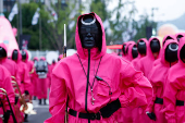 'Squid Game' characters parade through central Seoul