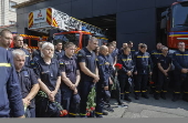Farewell ceremony for three Ukrainian rescuers in Kyiv