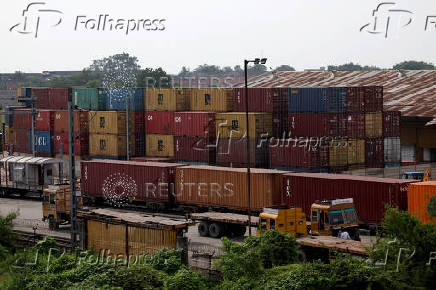 Shipping containers are parked at Thar Dry Port in Sanand