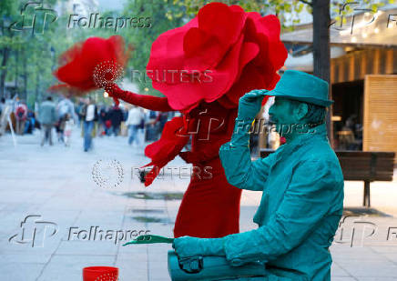 Live statue artists perform to mark World Art Day in Skopje