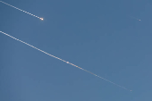 Missiles launched from Iran towards Israel are seen from Hebron