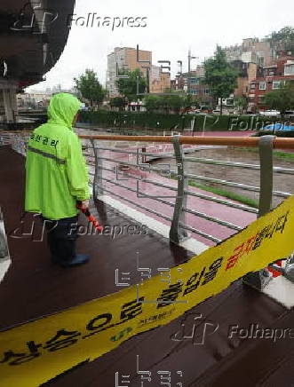 Seoul walking trail closed due to rising stream after heavy rain
