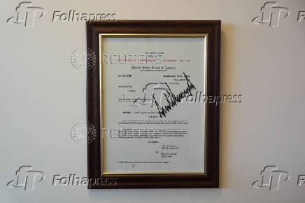 Framed Court Order Against Associated Press Hangs in Brefing Room
