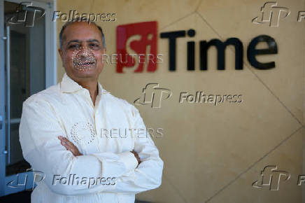 Rajesh Vashist, chief executive of timing chip company SiTime, poses at the company's Santa Clara headquarters, in California