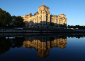 Sunlight illuminates the Reichstag building, the seat of the German parliament, in Berlin