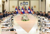 The Prime Minister of Laos meets his Malaysian counterpart during his visit to Malaysia