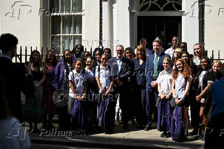 British Prime Minister Keir Starmer meets with school children, in London