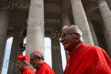 Cardinals Luis Jose Rueda Aparicio, Ruben Salazar Gomez and Jorge Enrique Jimenez Carvajal arrive to attend the first Mass to be led by Pope Leo XIV in the Sistine Chapel at the Vatican