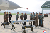 North Korea's Kim oversees air drills