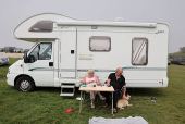 People enjoy the beach in England