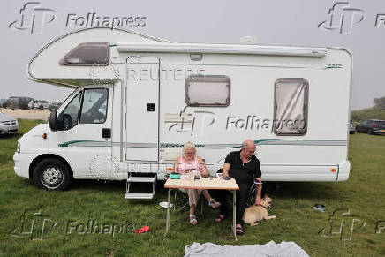 People enjoy the beach in England