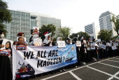 Pro Palestinians protest outside the US embassy in Jakarta