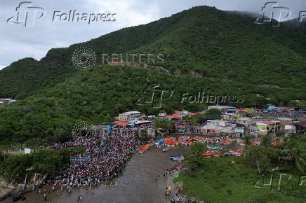 People celebrate Saint John the Baptist, in Ocumare de la costa
