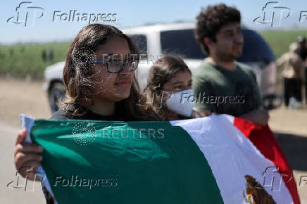 U.S. federal agents and immigration officers raid an agricultural facility in Camarillo