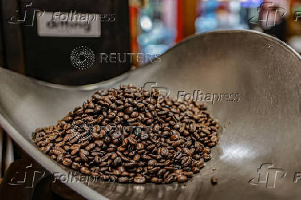 Coffee beans are seen on the scale at Porto Rico Importing Co. store in New York City