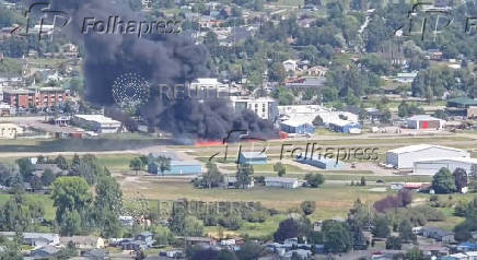 Smoke rises following a plane crash at Kalispell City Airport
