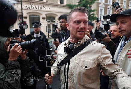 Political activist Tommy Robinson faces court over journalist harassment