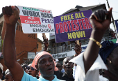 Nigerians demonstrates on the streets of Lagos to commemorate Nigeria's Democracy Day in Lagos