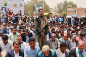 University students and professors perform prayers to ask for rain in Sanaa