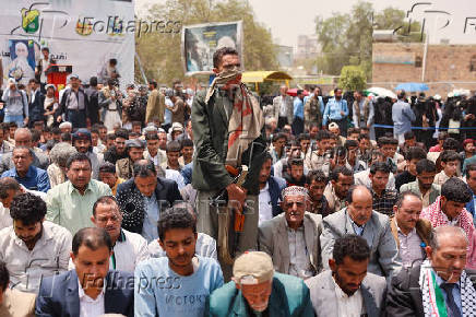 University students and professors perform prayers to ask for rain in Sanaa