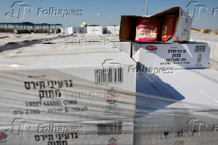 Humanitarian aid is waited to be transferred into Gaza from Israel, at the Gaza part of the Kerem Shalom crossing in the Gaza Strip