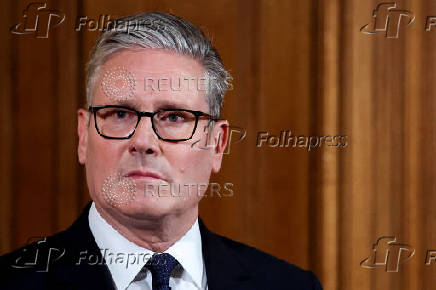 Britain's PM Starmer delivers statement inside No. 10 Downing Street, in London