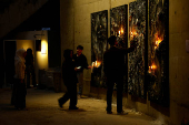 Visitors interact with an artwork installation at the 