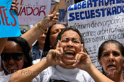 Family members of migrants imprisoned in El Salvador protest in Caracas