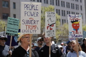 People Rally to Protest Trump policies and Billionaires agenda