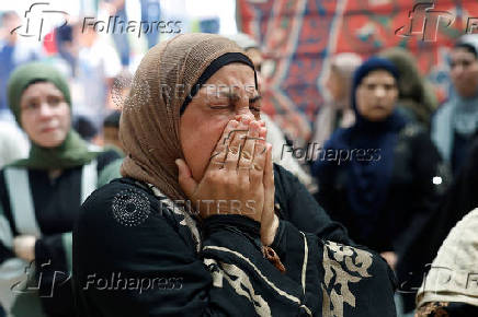 Mourners take part in the funeral of Mohammad Al-Shalabi, near Ramallah