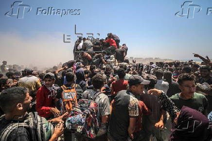 Aid enters Gaza Strip after Israel announces daily pause of hostilities
