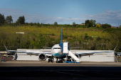 A Boeing jet intended for use by a Chinese airline returns to Boeing Field, in Seattle, Washington