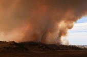 Firefighters tackle the Madre Fire near New Cuyama