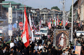 Shi'ite mourners participate in a Muharram procession ahead of Ashura in Srinagar