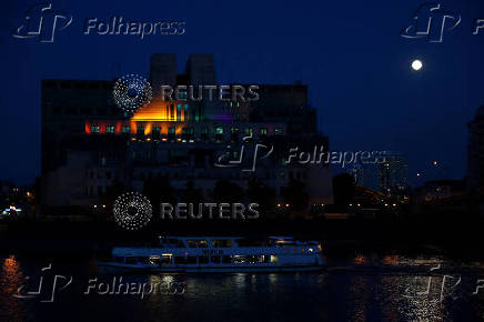 The MI6 building is illuminated to mark the  Pride in London Parade in London