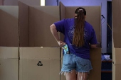 A young woman votes at a pre-polling centre in Sydney