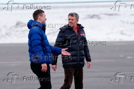 Denmark's King Frederik and Greenland's Prime Minister Jens-Frederik Nielsen arrive in Nuuk