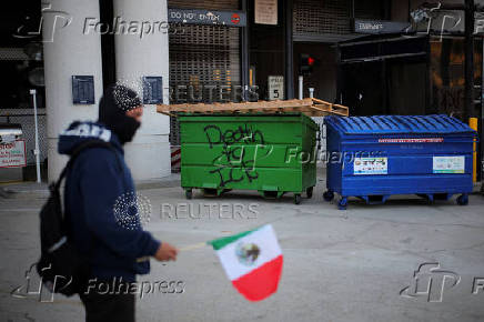 Protesters gather around the Los Angeles Federal Building after multiple detentions by ICE, in Los Angeles