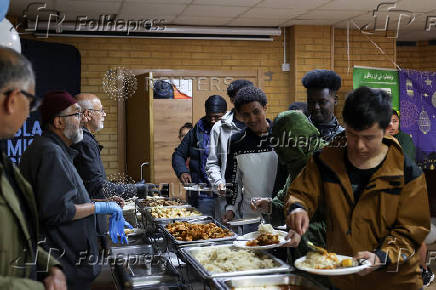 Khizra Mosque hosts a lunch as part of its Eid al-Adha celebrations, in Manchester