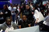 Katsuhiro Harada, Japanese director, producer, and creator of the video game Tekken, visits the Paradise Game room in Abidjan