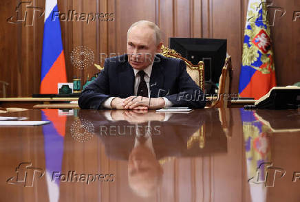 Russian President Vladimir Putin appoints Andrei Nikitin acting transport minister, in Moscow
