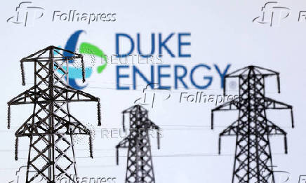 FILE PHOTO: Illustration shows Electric power transmission pylon miniatures and Duke Energy logo