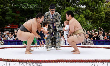 Babies take part in 'Nakizumo' or baby crying sumo contest at Senso-ji temple in Tokyo