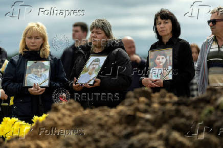 Funeral of the Tamara, Stanislav and Roman Martyniuk who were killed in a Russian missile strike in Korostyshiv