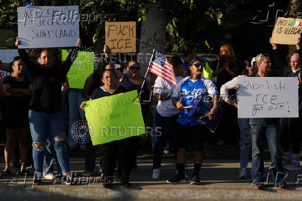 Protest against federal immigration sweeps, in Downey