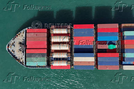 A drone view shows a cargo ship at Kwai Tsing Container Terminals in Hong Kong